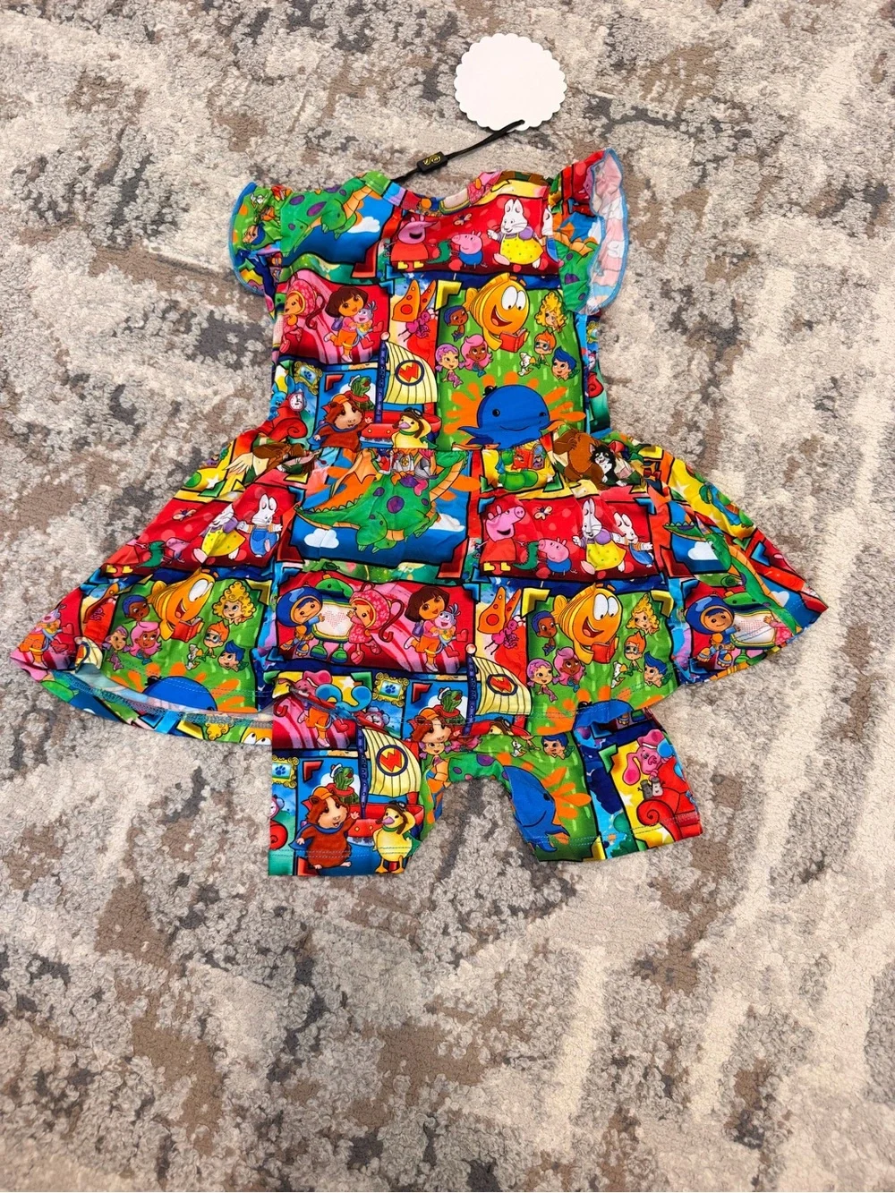 Adventure awaits, peekaboo, twirl onesie with shorts